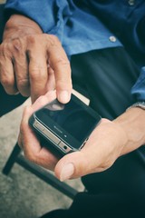 Senior man using smart phone
