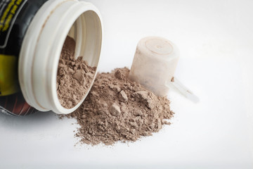 Spoon measure Whey protein chocolate powder for fitness and body