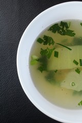 close up of a bowl chicken soup stock