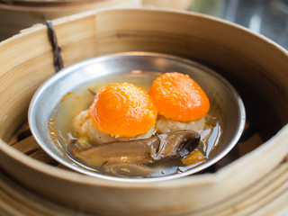Dim sum, York egg on pork Dumpling in the basket , Chinese Food