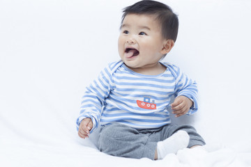 Cute Chinese baby boy in sailor suit