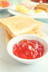 Slice toast bread with strawberry jam