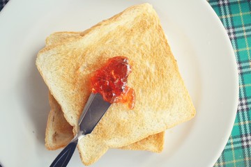 Slice toast bread with strawberry jam