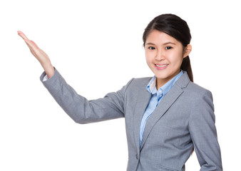 Asian young businesswoman with hand showing blank sign