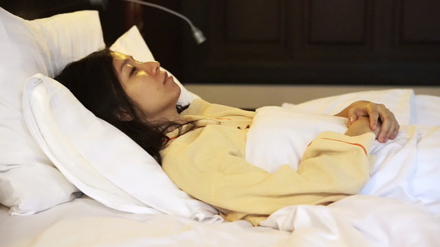 Video worried asian woman in bed, insomnia and thinking about life
