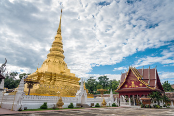 Fototapeta premium Golden Pagoda in Phra That Chae Haeng Temple, Nan province