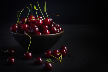 Fototapeta na wymiar fresh cherry on black background