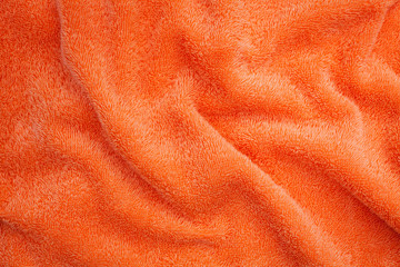 Wrinkled orange blanket