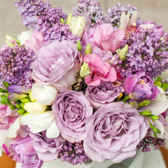 flower arrangement with lilac and eustoma flowers
