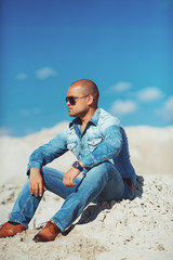 Man Relaxing On Beach