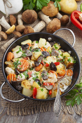Roast chicken with potatoes and mushrooms