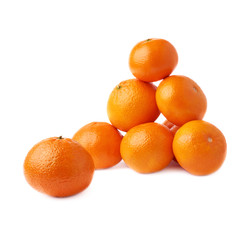 Pile of multiple ripe fresh juicy tangerines, isolated over the