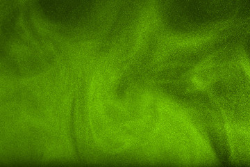 powder cloud against dark background