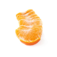 Line of fresh juicy tangerine fruit isolated over the white
