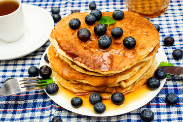 pancakes with berries and tea