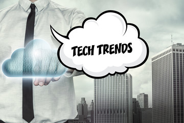 Tech trends text on cloud computing theme with businessman