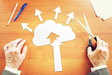 Businessman thinking about cloud technology. Abstract conceptual image