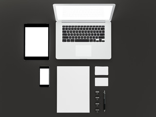 Mockup business template. Set of elements on the black table.