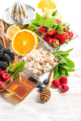 Breakfast with croissants, muesli, fresh berries, fruits