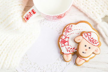 Christmas gingerbread sheep with cup of milk