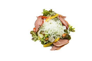 Salad with arugula and duck breast.