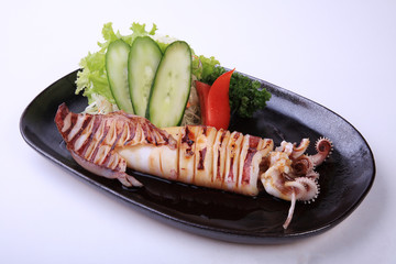 Ika Teriyaki, roasted squid with teriyaki sauce isolated on white background