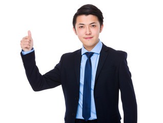 Asian young businessman with thumb up gesture