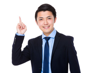 Businessman with finger point up