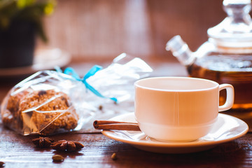 teapot, cup of  tea and the vegetarian cookies