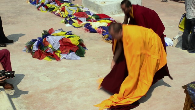 Tibetan Buddhist monks near stupa
