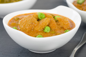Aloo Matar - Potatoes and green peas cooked in a mild creamy tomato gravy. Chapattis and other...