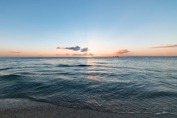 Sunset, sunlight, sea. Okinawa, Japan, Asia.