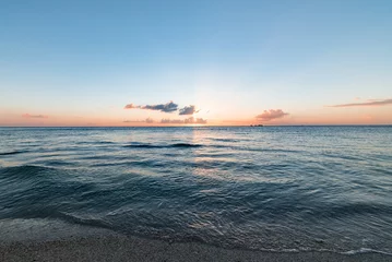 Foto op Plexiglas Zonsondergang aan zee Sunset, sunlight, sea. Okinawa, Japan, Asia.