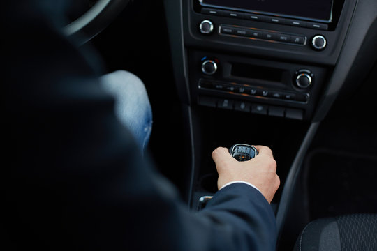 Hand Of The Driver On Manual Gear Shift Knob