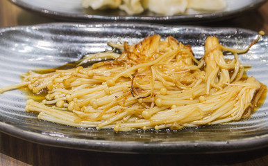Enoki mushrooms, Golden mushrooms, fried with butter.