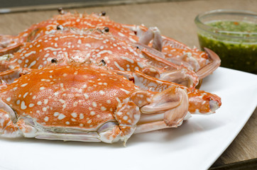 steamed crabs on wood background