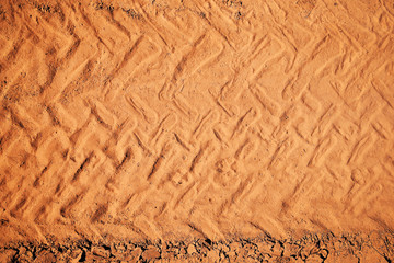 Top view of wheel tracks on dirt