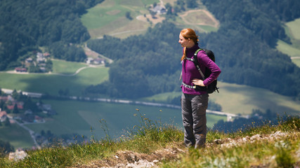 Naklejka premium Woman Hiking in the Mountains