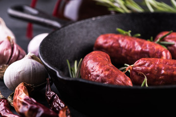 chorizo sausage on frying pan