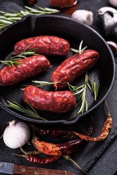 chorizo sausage on frying pan