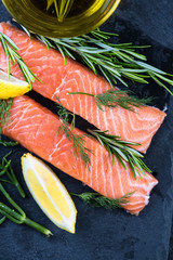 fresh salmon steaks with herbs and lemon