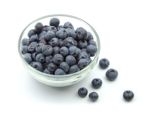 ripe blueberries in bowl isolated on white