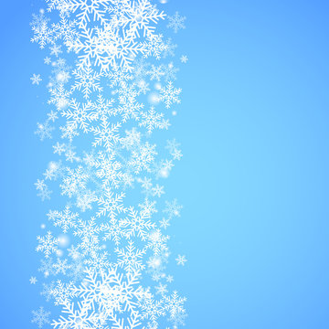 Abstract blue Christmas background with snowflakes.