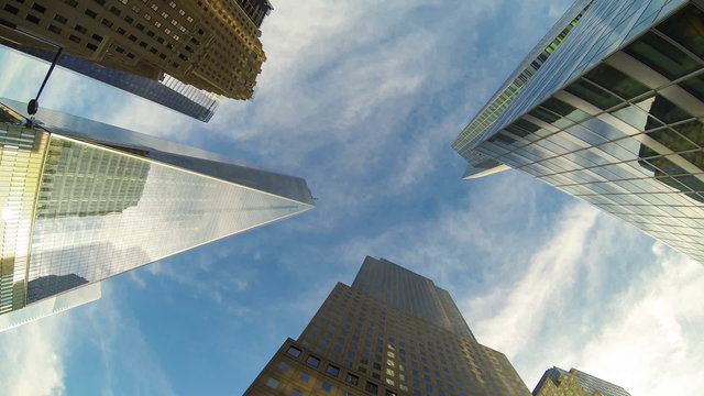 Time-lapse view of skyscrapers and clouds, bottom view
