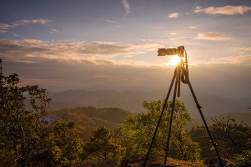 Silhouette tripod and camera