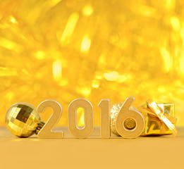2016 year golden figures and golden Christmas decorations