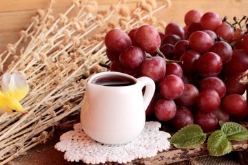 Bunch of grapes fruit  juicy fresh delicious and red wine.