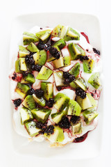 Pavlova with kiwi and berries
