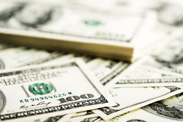 Stack of one hundred dollar bills close-up.