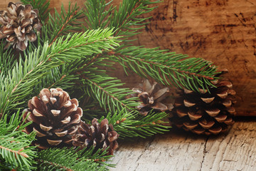 Fototapeta premium Fir cones and branches, Christmas and New Year's background, sel